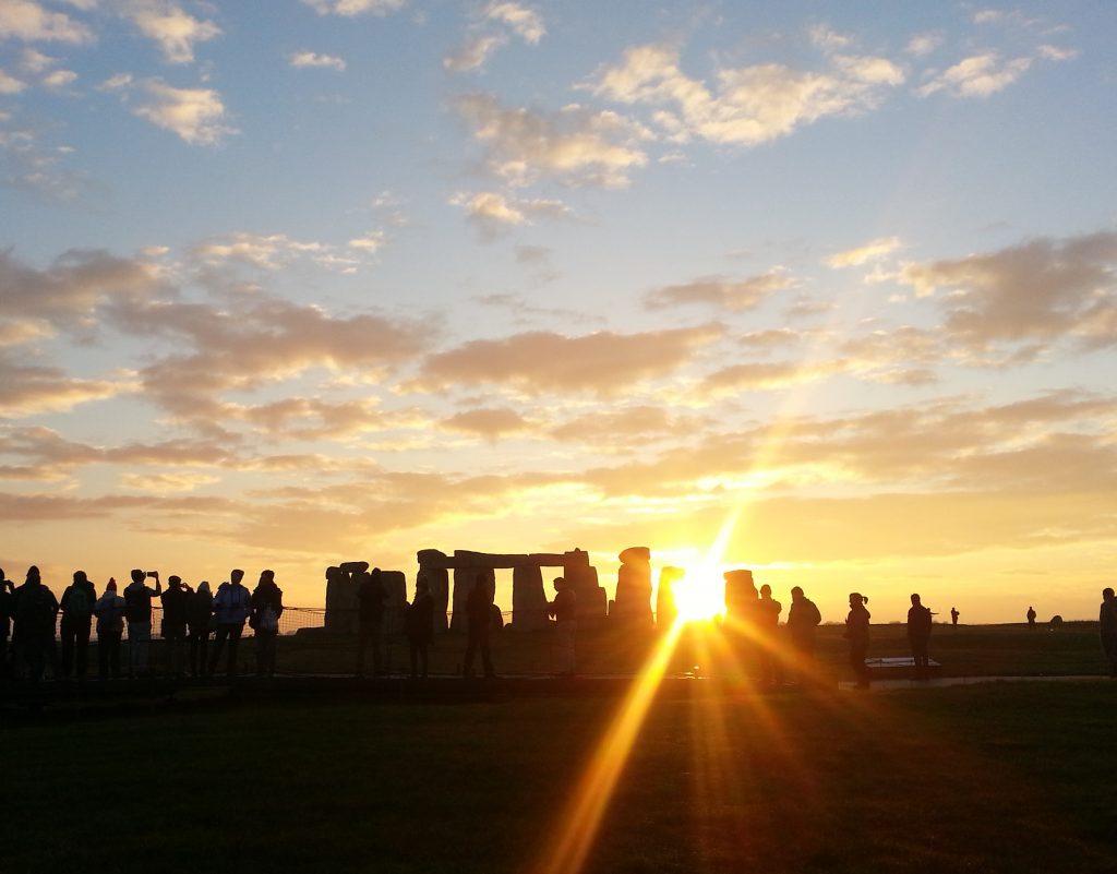 Stonehenge sunset from over the fence