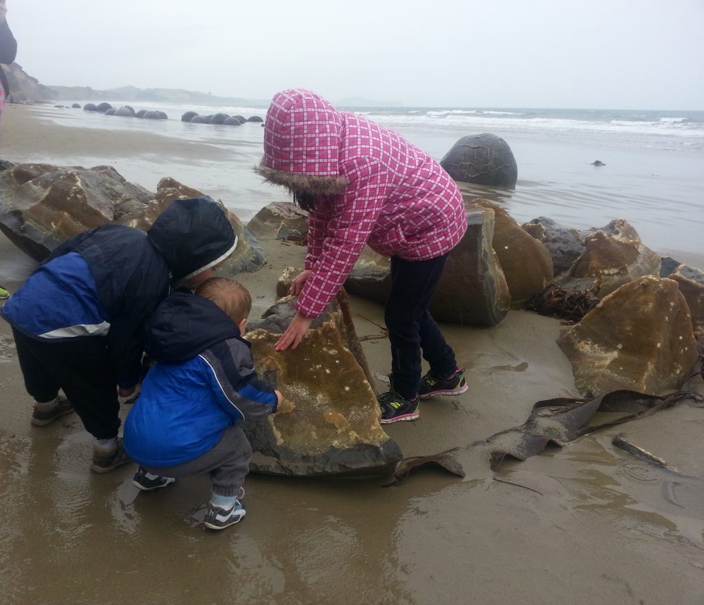 Inspecting a shattered boulder