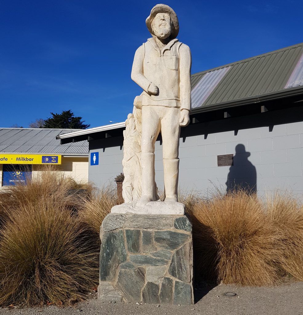 Statue of a prospector at Lawrence